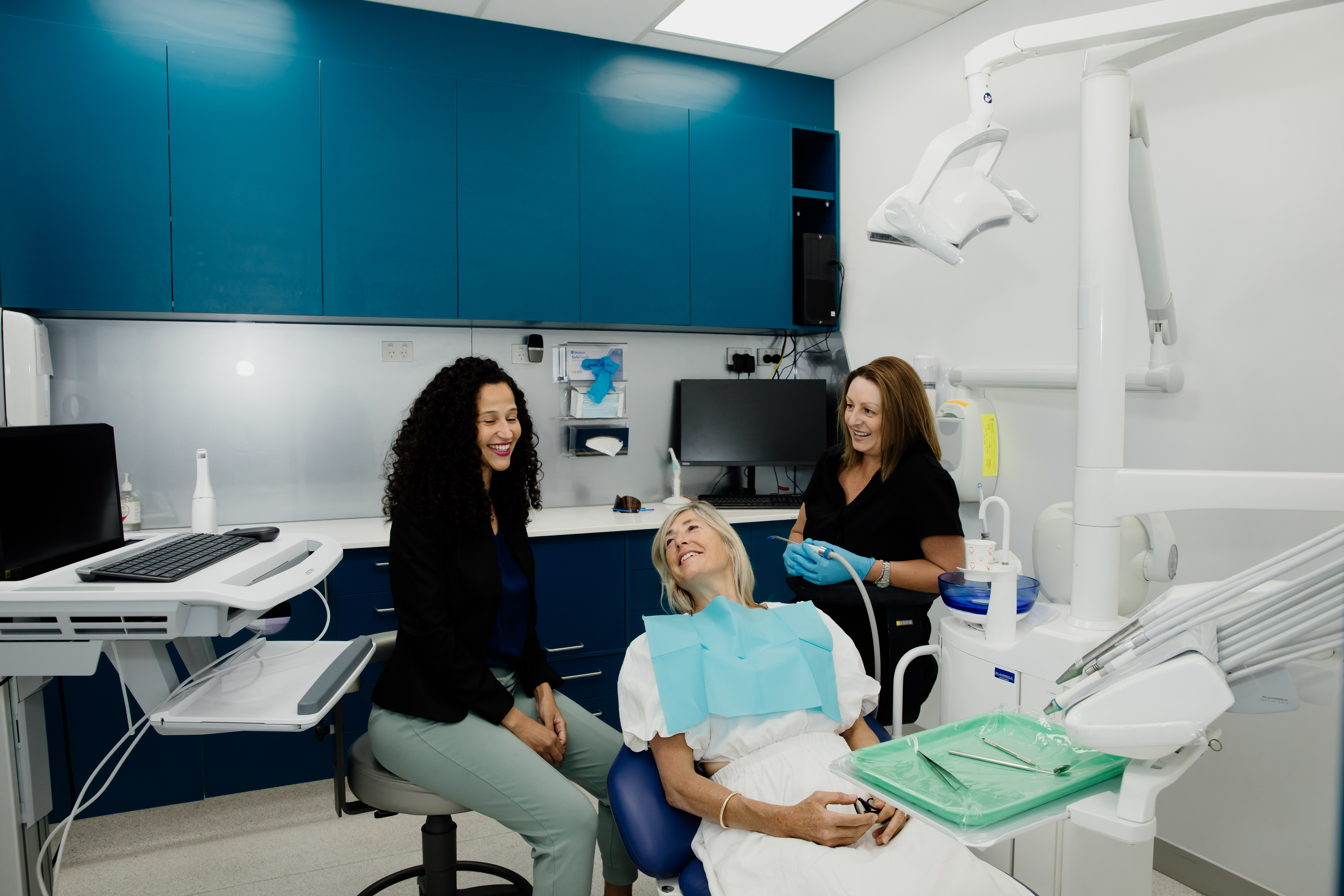 Dental team with patient